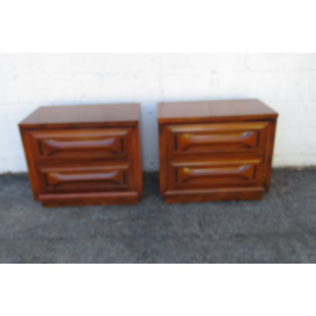 This classic Pair of Nightstands is made of wood, solid wood, and veneer. These two End Tables feature highly Mid century...