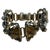 This vintage sterling silver bracelet centers on two dramatic triangular smokey quartz cabochons, their warm honey-brown...