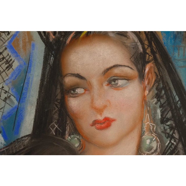 Elegant vintage pastel portrait of a woman in a traditional black lace mantilla, signed “R. Casas” at lower right. The...