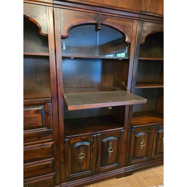 A clean and original mid century modern era ethan allen style three cabinet etagere cabinet wall unit set . Having the...