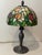 This stunning 22-inch Tiffany-style table lamp features a meticulously handcrafted 12-inch stained glass shade with a...