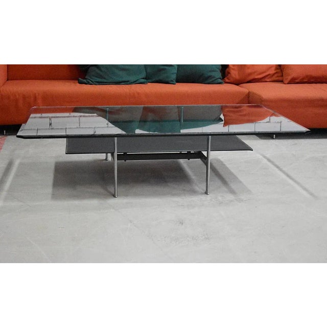Diesis is a coffee table by Antonio Citterio and Paolo Riva for B&B Italia. Structure in die-cast polished aluminum....