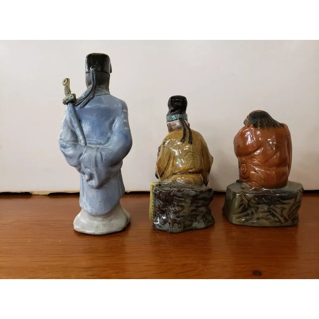 This is a Circa 1970 Set of 3 Chinese Shiwan Mudmen Taoist Immortals Figurines. They measure from left to right: 7 1/2"...