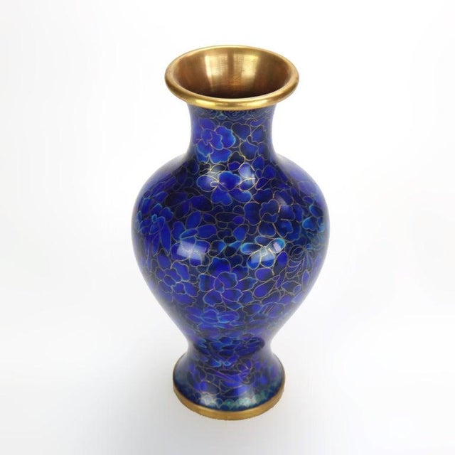 Chinese Blue Cloisonne Floral Enameled Vase 20thC. Measures- 9.25"H x 5"W x 5"D. A beautifully crafted Chinese cloisonné...