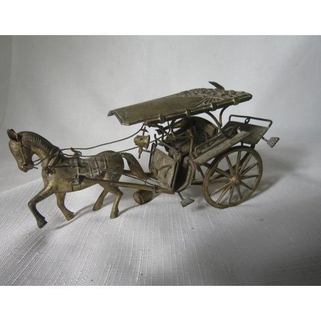 Highly detailed silverplated Djokja Carriage with Horse and Driver. Crafted with intricate Filigree and repousse design....