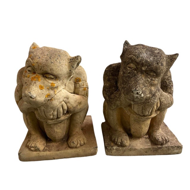 Add a touch of classical, gothic drama to your outdoor living space with this striking pair of vintage cast stone gargoyle...