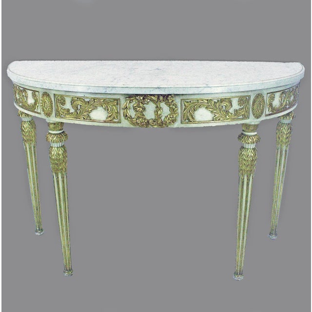 Mid-20th century argentine Empire Revival giltwood and marble demi-lune table/console by Maison Jansen By: Maison Jansen...