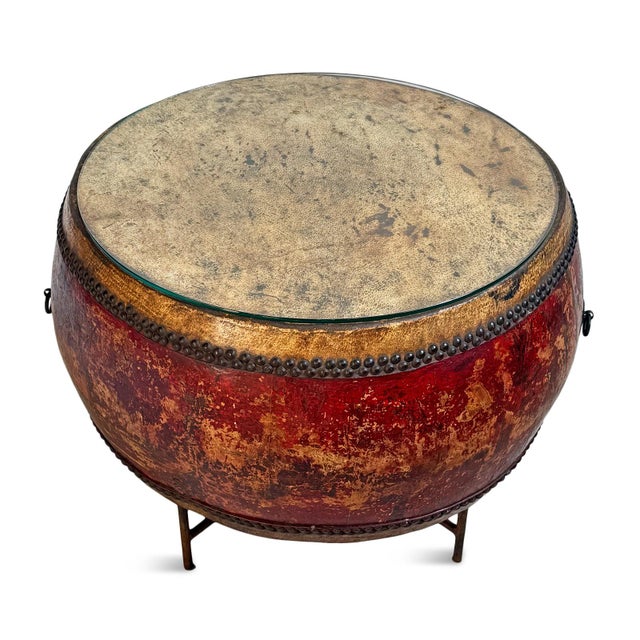 A striking antique Mongolian drum table richly layered with history and character. Features its original hand-painted red...