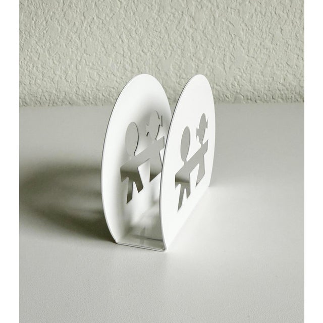Playful "Girotondo" paper napkin or letter holder designed by the duo King-Kong (Stefano Giovannoni and Guido Venturini)...