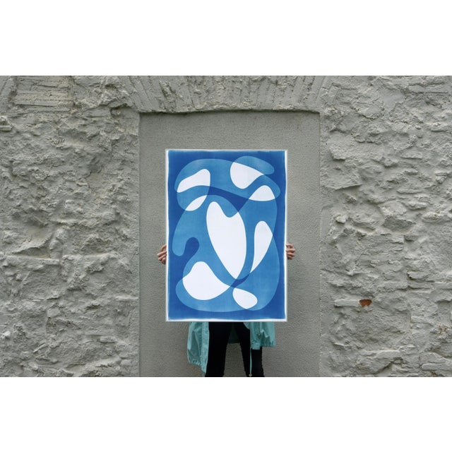 This is an exclusive handprinted unique cyanotype that takes its inspiration from the mid-century modern shapes. It's made...