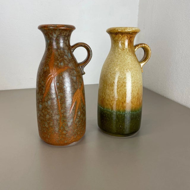 Article: Set of two fat lava art vases Producer: Scheurich, Germany Decade: 1970s These original vintage vases was...