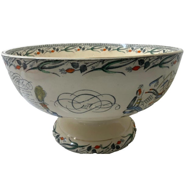 The Burgess & Leigh Farmers Arms 12" Punch Bowl, made in England in 1890, is an antique vintage piece with a capacity for...