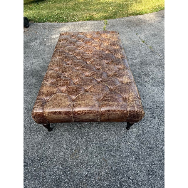Beautiful stately tufted vintage leather ottoman perfectly aged for that ‘lived in’ feel. High quality, supple leather....