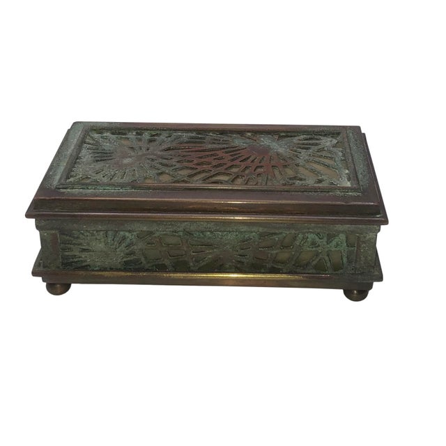 An early 1900s Tiffany Studios pine needle, Carmel slag stamp box. Circa 1910 - 1920.