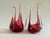 Ruby red glass with controlled bullicante technique—precisely distributed air bubbles creating internal luminosity. The...