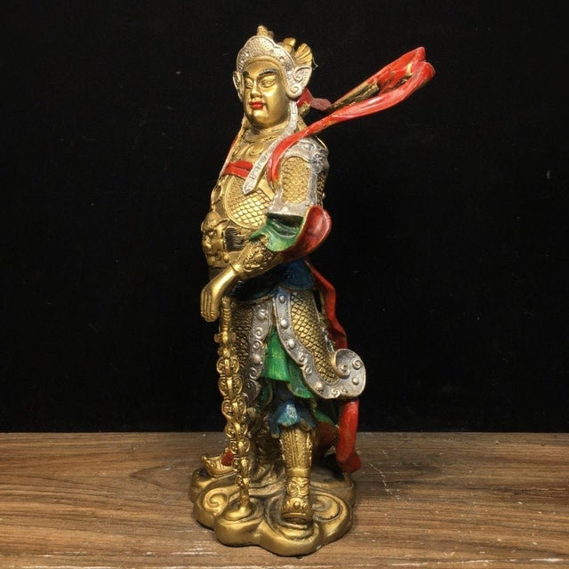 This is a finely crafted antique polychrome bronze sculpture of Skanda (also known as Weituo), a revered Bodhisattva and...