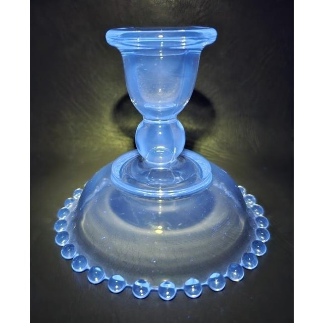 This VTG Candlewick Skirted Imperial Clear Glass 3 3/4" Candle Stick Holder is a vintage piece from the mid-20th century,...