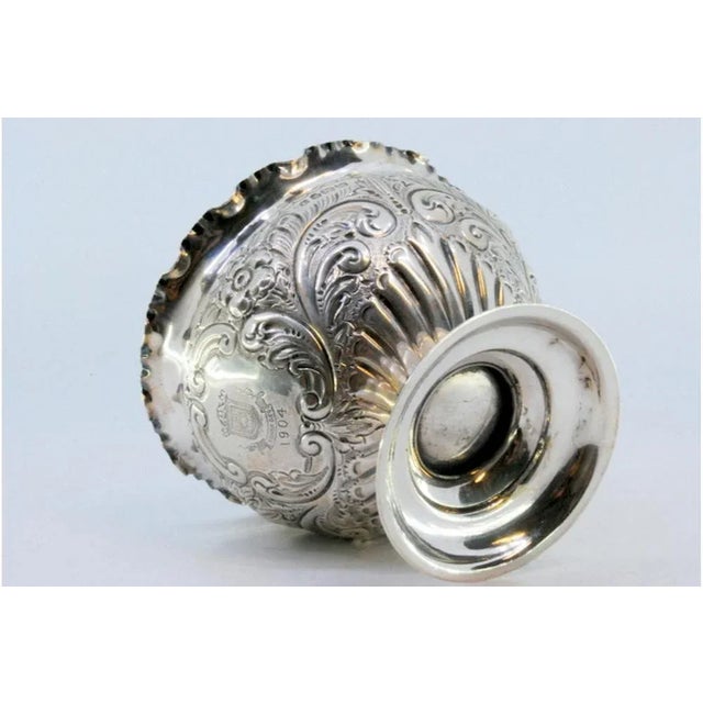 Silver Bowl with Floral Reliefs and Smooth Round Base, in Very Good conditions. Designed 1890 to 1919 This piece has an...