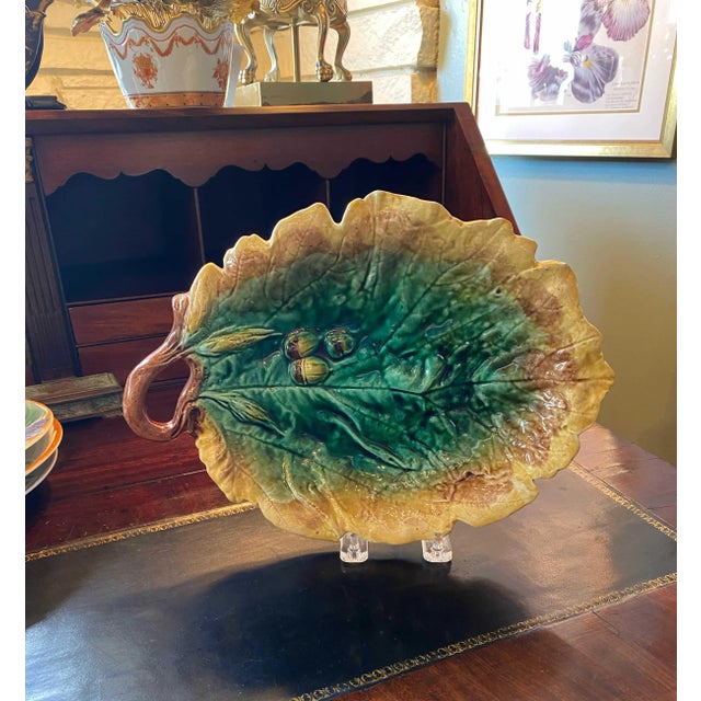 19th century majolica leaf dish with acorns. In shades of gold, greens and brown. Circa 1880, England.