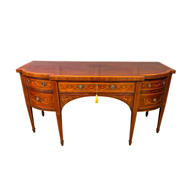 A very fine George III period inlaid mahogany sideboard of exceptional quality and elegant design with unusual, and very...