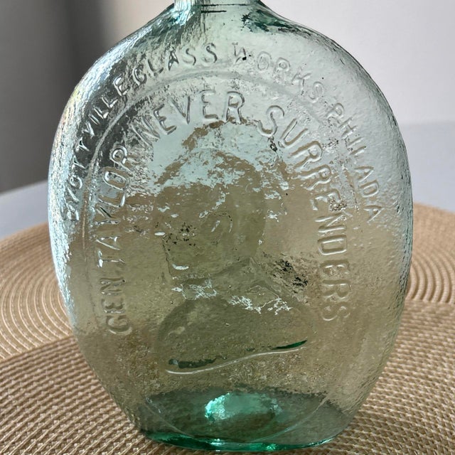 This Patriotic American Flask Bottle was made by the American glass company Dyottville Glass works of Philadelphia. The...