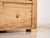 Chest of drawers in stripped pine, originally from central europe and dated to the early twentieth century. A piece of...