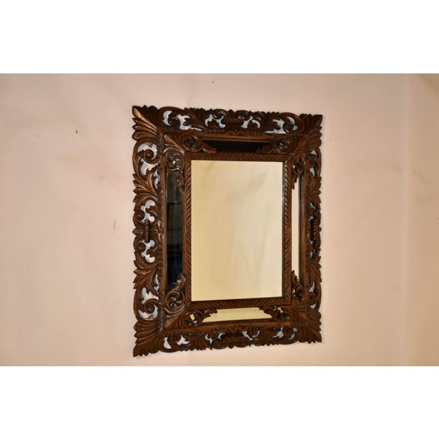 19th century wonderfully hand carved cushion mirror which came out of the grand house Locksley Hall in Staffordshire. The...