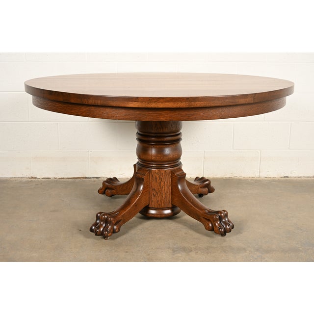 R. J. Horner Style Antique Victorian Carved Oak Split Pedestal Extension Dining Table With Lion Paw Feet | Newly Refinished For Sale - Image 13 of 14