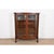 A beautiful antique American Empire or Victorian bow front bookcase or display cabinet In the manner of R. J. Horner & Co....