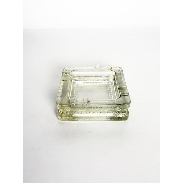 French glass block ashtray dating from the 1930s, in the style of Le Corbusier, featuring a distinctive architectural...