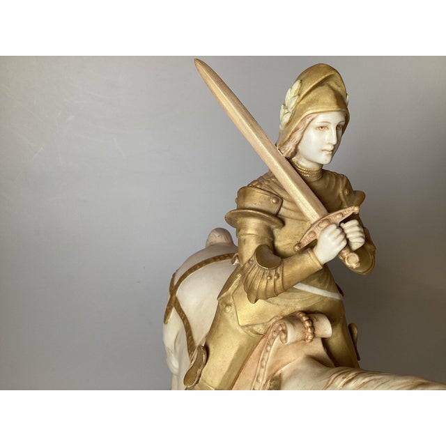 Stunning porcelain figure of Joan of Arc, made by Royal Vienna. The highly detailed sculpture with had painted details...