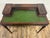 This is a gorgeous and rare vintage Georgian style green leather top office, library, or writing desk with tooled border....