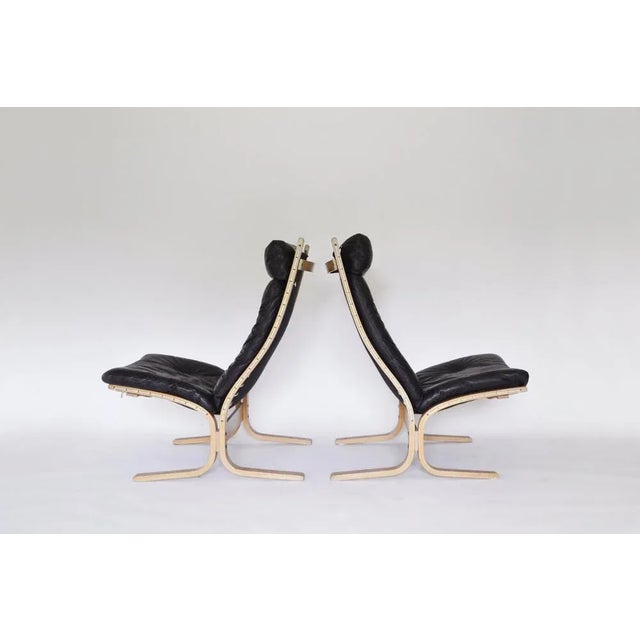 An original lounge set of Siesta high-back, high-back chairs with an ottoman. Designed by Ingmar Relling in the 1960s and...