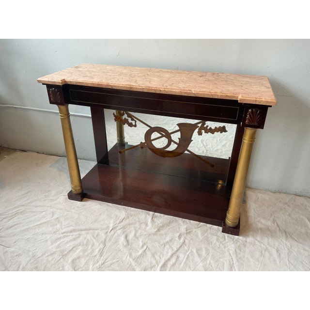 1940s John Tavis Hollywood Regency hand painted mirrored back console with beveled marble top. Wood and gold area needs...