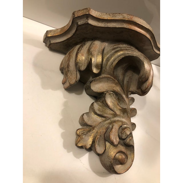 This lovely Vintage Hand-Carved Acanthus Leaf Wall Shelf will be a sophisticated standout in your interior decor. This...