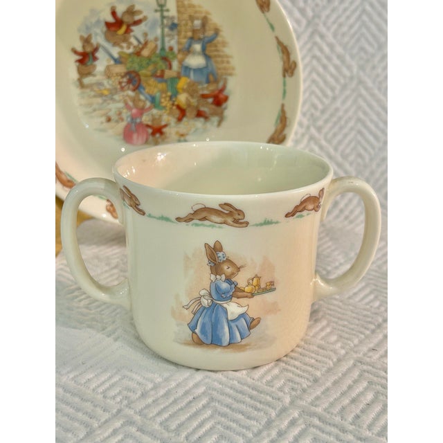 Collectible and a wonderful gift, this set of a cereal bowl and mug are from the “Bunnykins” collection by Royal Doulton....