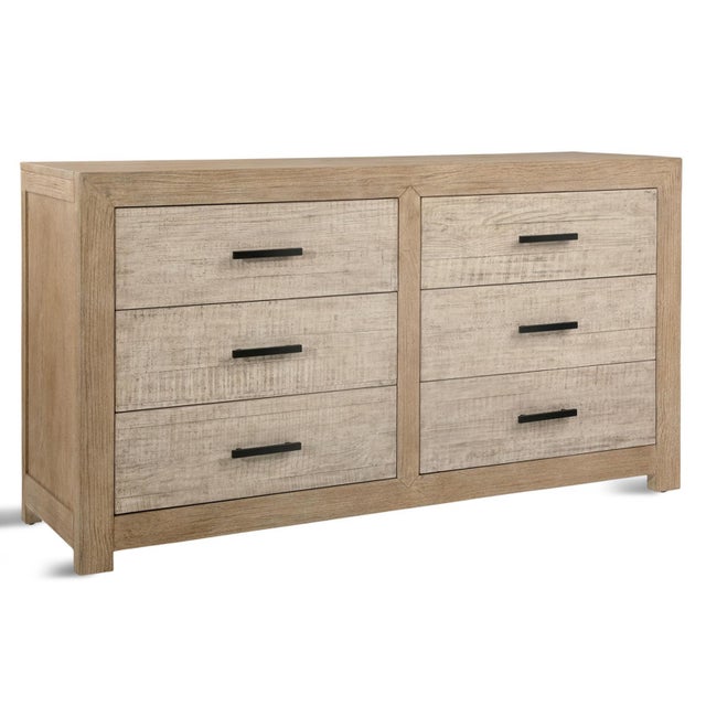 Crafted from solid salvaged pine, this six-drawer dresser pairs a softly washed finish with a clean frame showcasing the...
