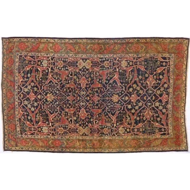 This master piece is a wool on wool pile genuine hand made very fine antique Persian Halyavi Bijar carpet - Geruz design.