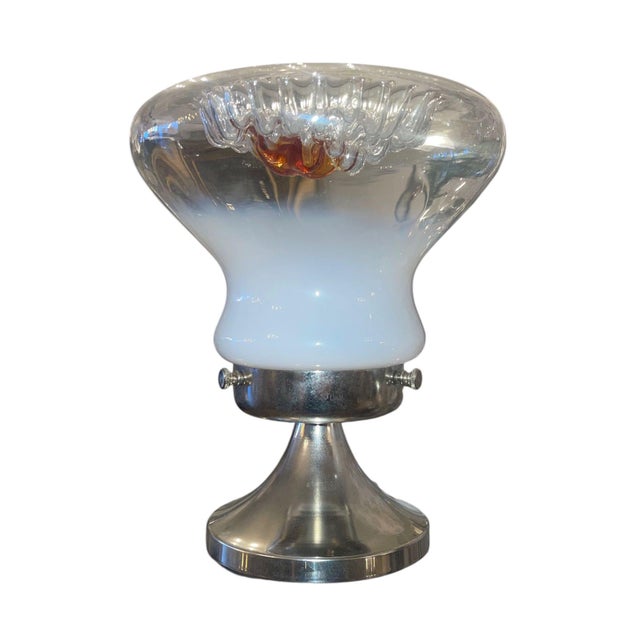 A striking pair of Mid-Century Modern table lamps designed by Toni Zuccheri for Mazzega, Murano, Italy, circa 1970s. These...