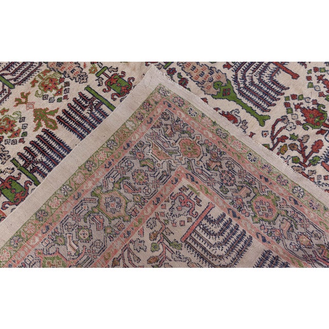 A hand-knotted wool antique Persian Sultanabad rug dating back to circa 1920. The pattern incorporates two classic Persian...