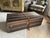 Signs of use consistent with age. Wear to the canvas, leather, wood, and brass hardware with scratches, scuffs, stains,...