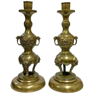 Pair of Brass Taper Candlesticks With Flowers and Griffins