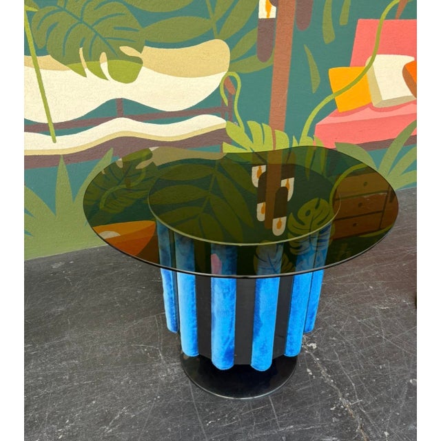 This bar exudes the feeling of the space age era - tulip base, black lucite, convex, curved paneling, fuzzy blue covering....