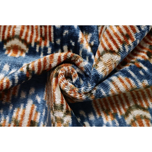 "Rich in color, texture, and artisan heritage, this handmade silk velvet pillow brings a sophisticated interpretation of...