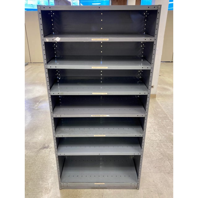Vintage heavy duty gray factory painted steel book shelving, total of two cases/units currently available, manufactured by...