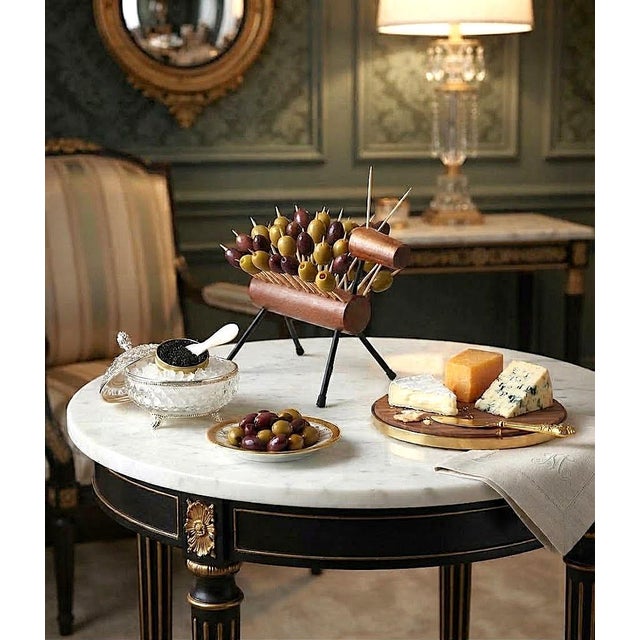Offering a sculptural cocktail pick holder attributed the Danish designer Laurids Lønborg. This 1960s authentic...