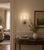 Stunning Murano wall light by artist Ercole Barovier. The wall light consist of a glass leave and a brass structure. It...