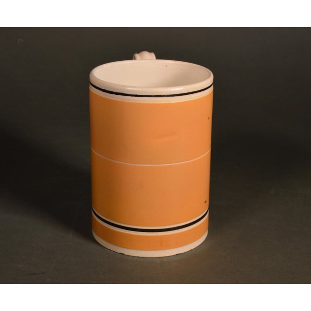 The Tavern Stripe: English Mocha Ware Mug This is an elegant English Mocha Pottery mug or tankard, a fine example of...