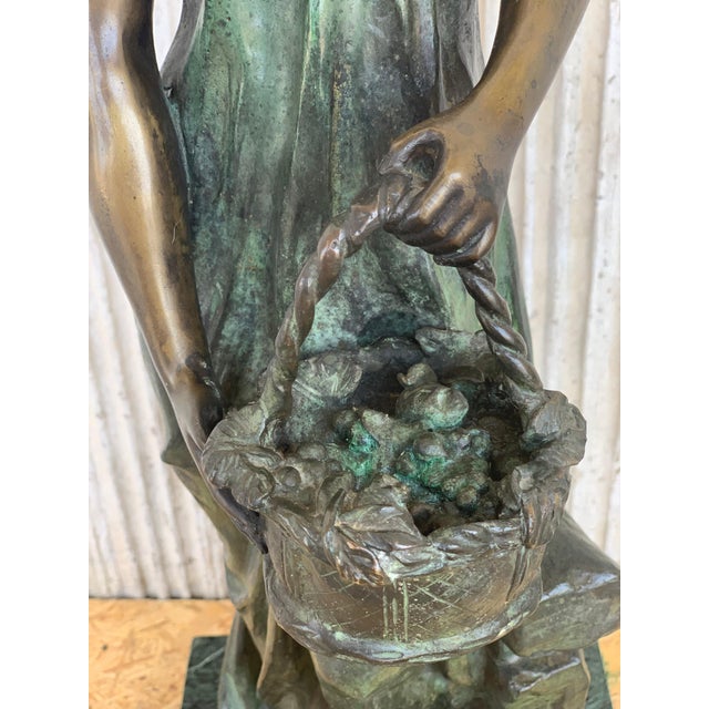 The famed Italian sculptor Ferdinando de Luca created this incredible cast bronze likeness of a girl in the 20th century....