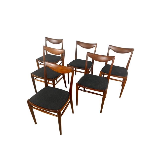 A beautifully sculptural set of six Norwegian “Bambi” dining chairs designed by Rastad & Relling Tegnekontor and produced...